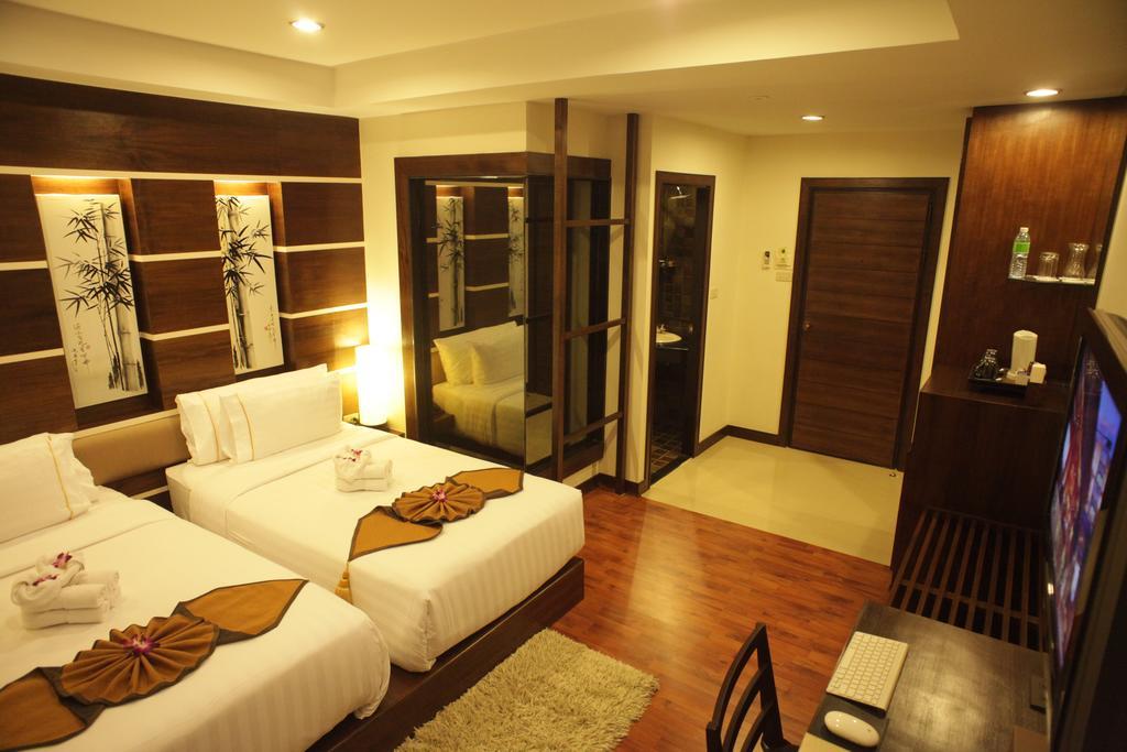 Hotel Bamboo House Phuket Karon Exterior foto